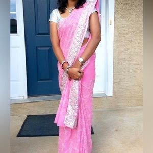 Pink saree with intricate silver sequins and embroidery with blouse